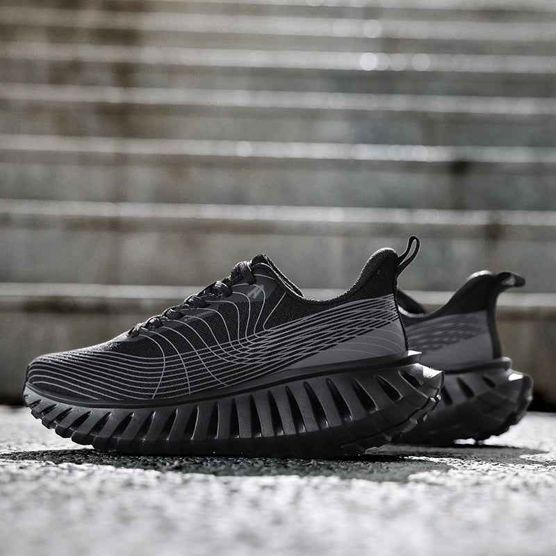 Swag+Chic black sneakers with futuristic design and unique thick ridged sole on outdoor steps