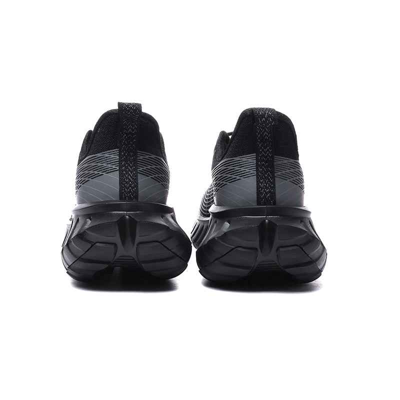 Rear view of black and gray sneakers with textured soles by Swag Chic