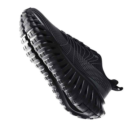 Swag Chic black sneakers with durable textured sole and sleek modern design for everyday wear